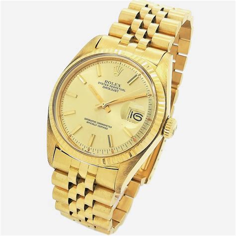 reloj rolex de oro con grabados